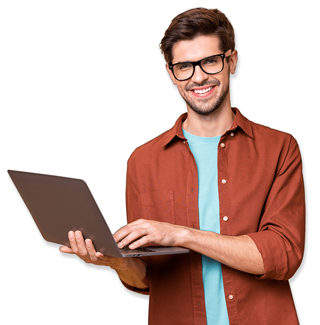 A man holding a laptop smiling
