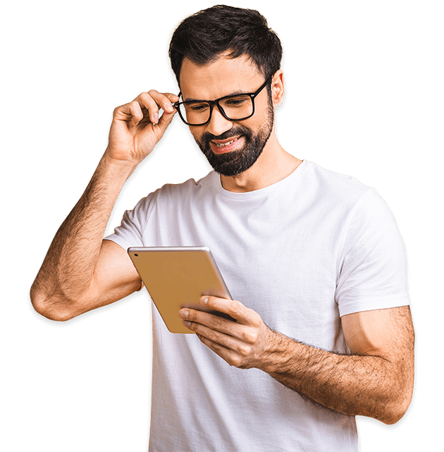 A man holding a tablet smiling