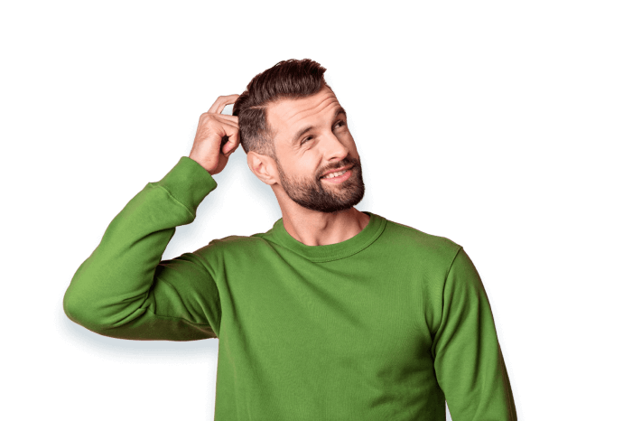 man looking up scratching his head