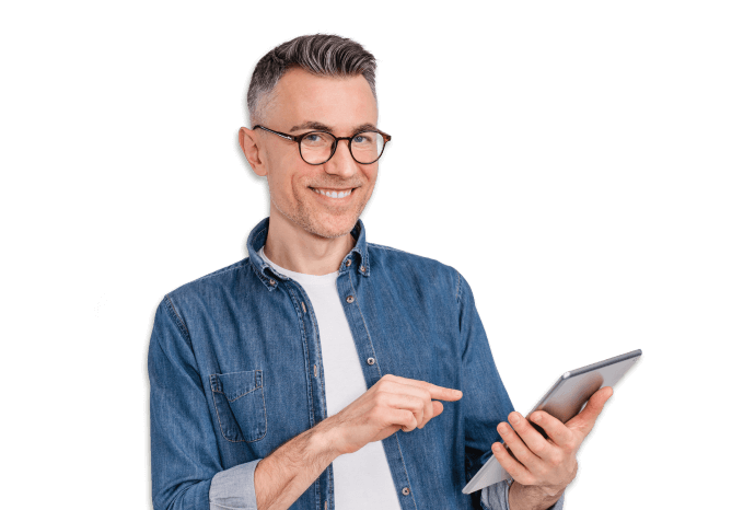 Man smiling pointing at a tablet