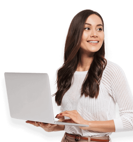 woman smiling holding a laptop