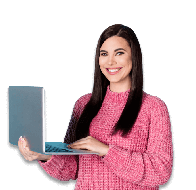 smiling woman stands with open laptop