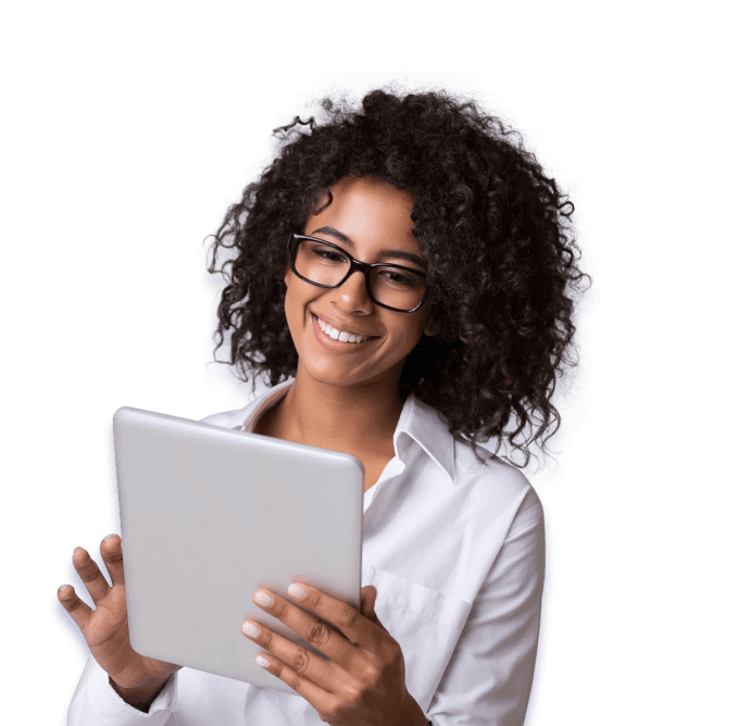 smiling woman stands with a tablet