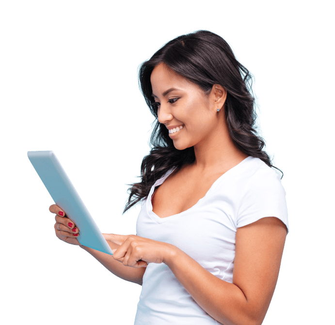 smiling woman stands with a tablet