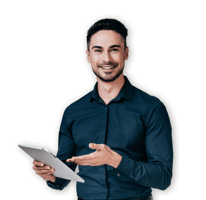 smiling man stands with a tablet