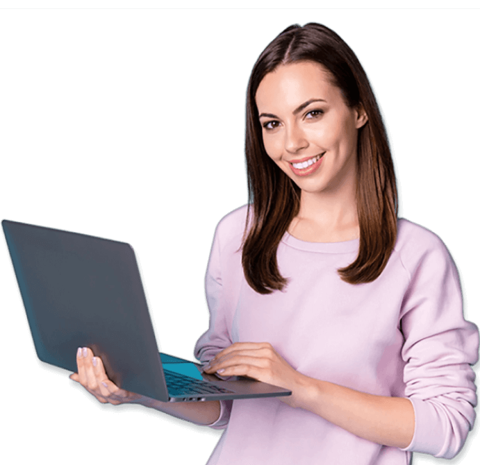 smiling woman stands with open laptop