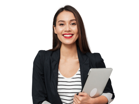Woman standing with a laptop in her arms