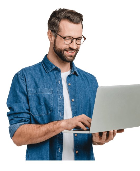 smiling man on a laptop